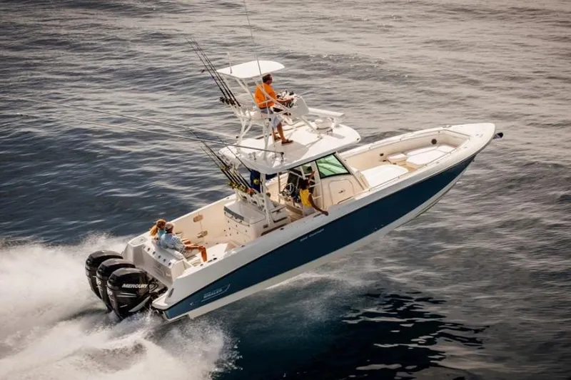 Slide: The Image of Manufacturer Provided Image: 2020 Boston Whaler 350 Outrage speeding on open water. - 26
