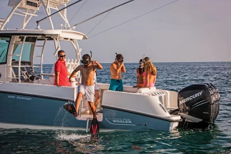Slide: The Image of Manufacturer Provided Image: People enjoying snorkeling from a 2020 Boston Whaler 350 Outrage boat. - 29