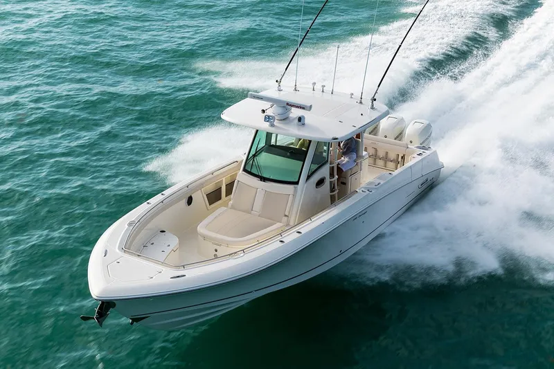 Slide: The Image of Manufacturer Provided Image: 2020 Boston Whaler 350 Outrage cruising on open water. - 30