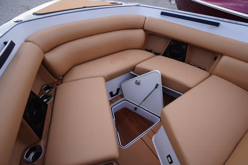 Slide: The Image of Luxurious seating area on 2020 Aviara AV32 OB boat with storage compartment. - 12