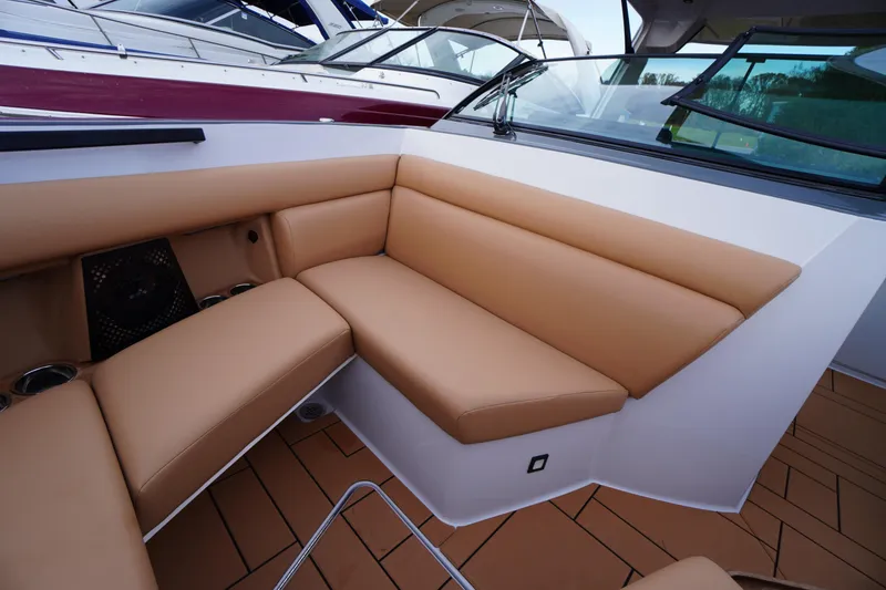 Slide: The Image of Luxurious tan seating on 2020 Aviara AV32 OB boat, featuring sleek design and comfort. - 19