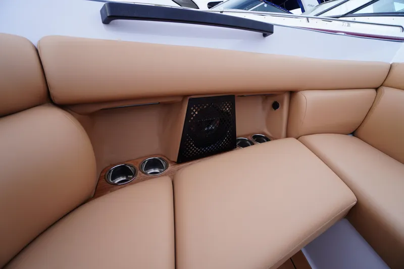 Slide: The Image of Luxurious tan seating with cup holders on 2020 Aviara AV32 OB boat. - 20