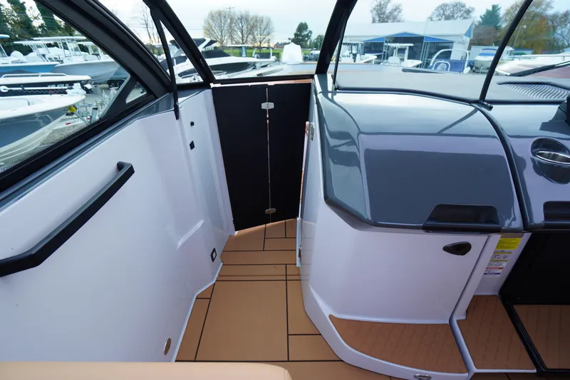 Slide: The Image of 2020 Aviara AV32 OB boat interior with sleek design and modern dashboard. - 24