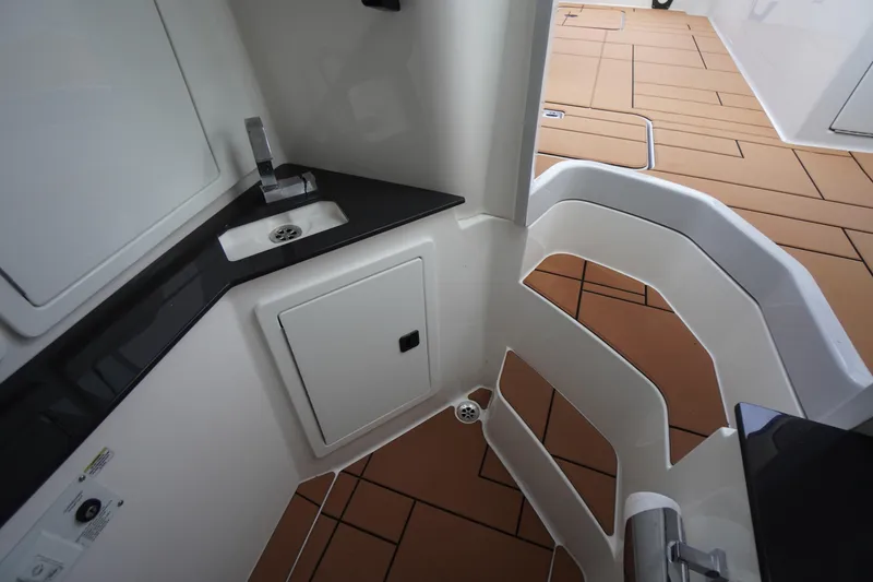 Slide: The Image of 2020 Aviara AV32 OB boat interior with sleek sink and modern design. - 34