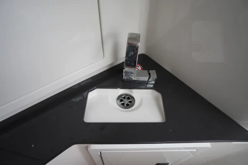 Slide: The Image of Compact sink with modern faucet in 2020 Aviara AV32 OB boat. - 35