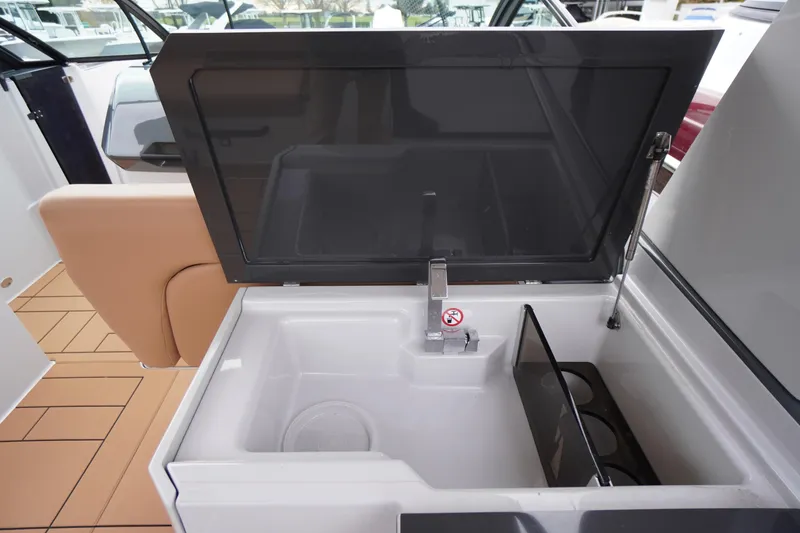 Slide: The Image of 2020 Aviara AV32 OB boat interior with sink and storage compartment. - 43