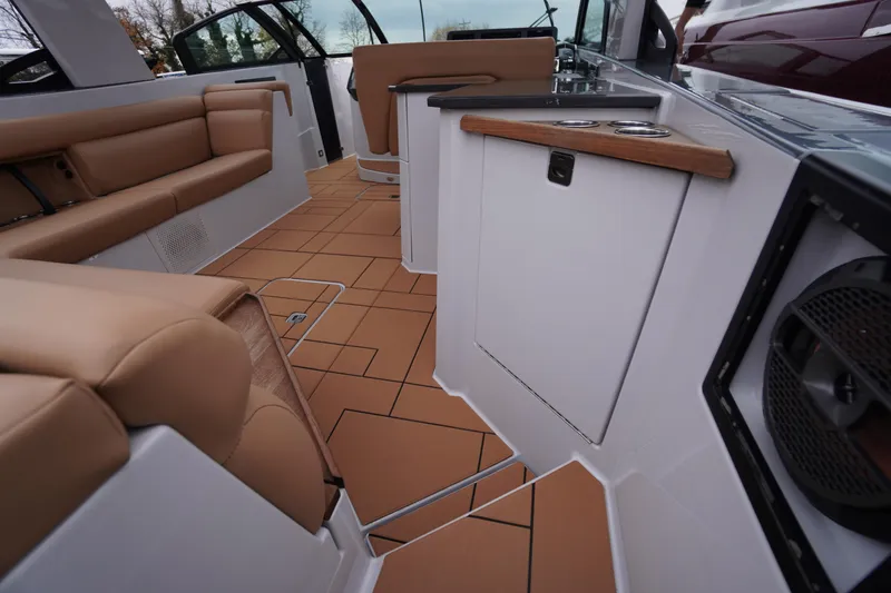 Slide: The Image of Luxurious interior of 2020 Aviara AV32 OB boat with tan seating and modern design. - 46