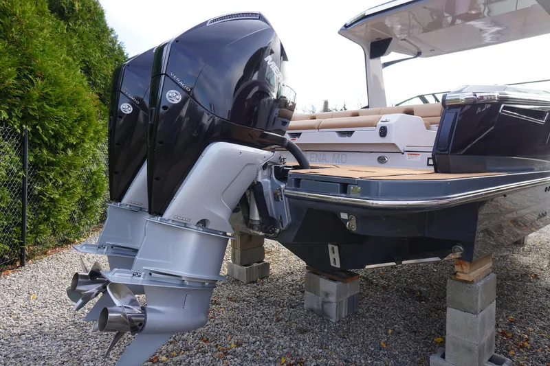 Slide: The Image of 2020 Aviara AV32 OB boat with dual outboard engines on display. - 6