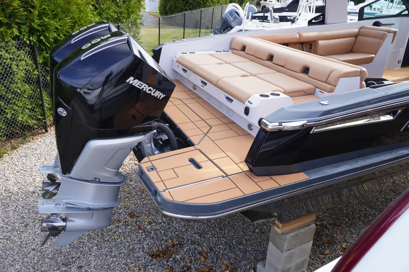 Slide: The Image of 2020 Aviara AV32 OB boat with Mercury outboard engines and tan seating. - 63