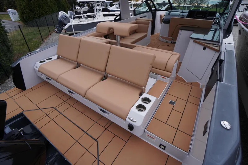 Slide: The Image of 2020 Aviara AV32 OB boat interior with tan seating and modern design. - 64