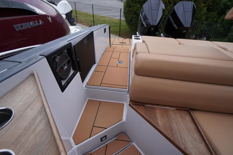 Slide: The Image of 2020 Aviara AV32 OB boat interior with tan seating and dual Mercury outboard engines. - 66