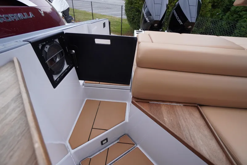 Slide: The Image of 2020 Aviara AV32 OB boat interior with tan seating and speaker system. - 67