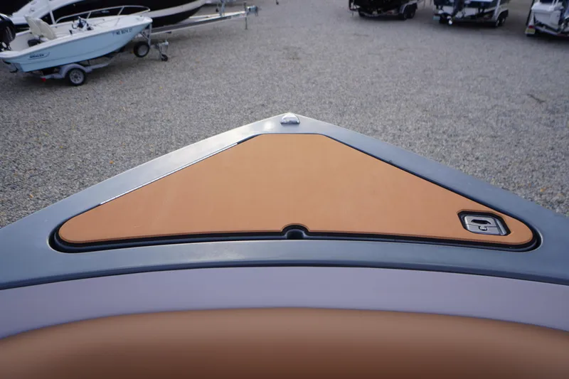 Slide: The Image of Bow view of 2020 Aviara AV32 OB boat with tan deck cover. - 8