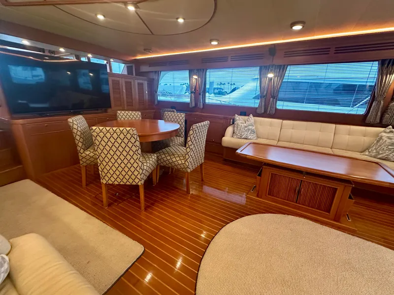 Slide: The Image of Luxurious interior of 2005 Marlow Explorer 78 yacht with elegant dining and seating area. - 10