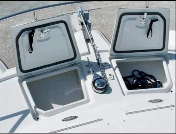 Slide: The Image of 2006 Glacier Bay 3480 Ocean Runner boat deck with open storage compartments. - 15