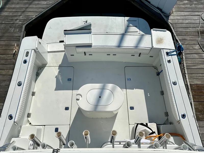Slide: The Image of 2006 Glacier Bay 3480 Ocean Runner boat deck with seating and storage compartments. - 17