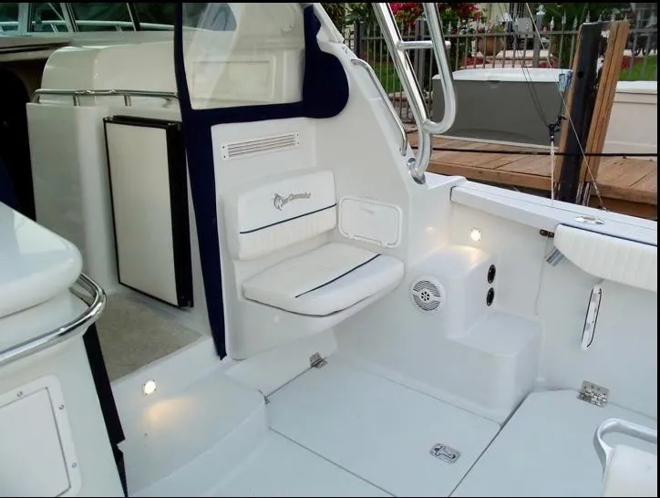 Slide: The Image of 2006 Glacier Bay 3480 Ocean Runner boat interior with seating and storage. - 19