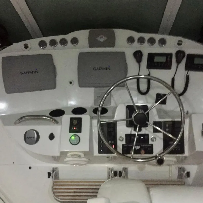 Slide: The Image of Control panel of a 2006 Glacier Bay 3480 Ocean Runner boat with Garmin navigation. - 23