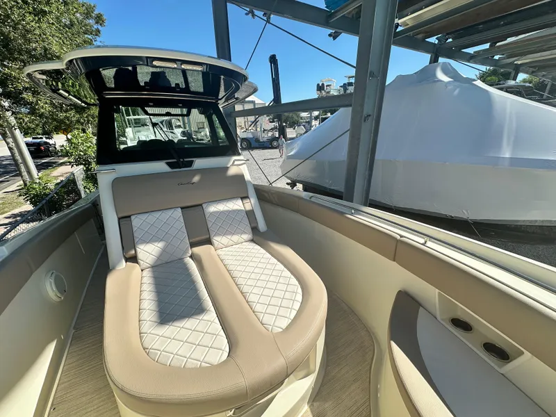 Slide: The Image of 2024 Chris-Craft Catalina 30 boat interior with cushioned seating. - 15