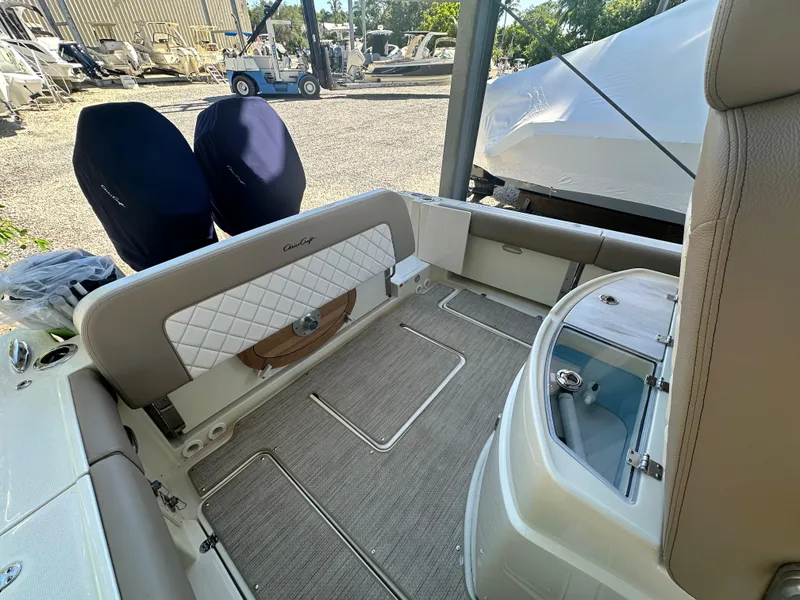 Slide: The Image of 2024 Chris-Craft Catalina 30 boat interior with seating and storage compartments. - 6