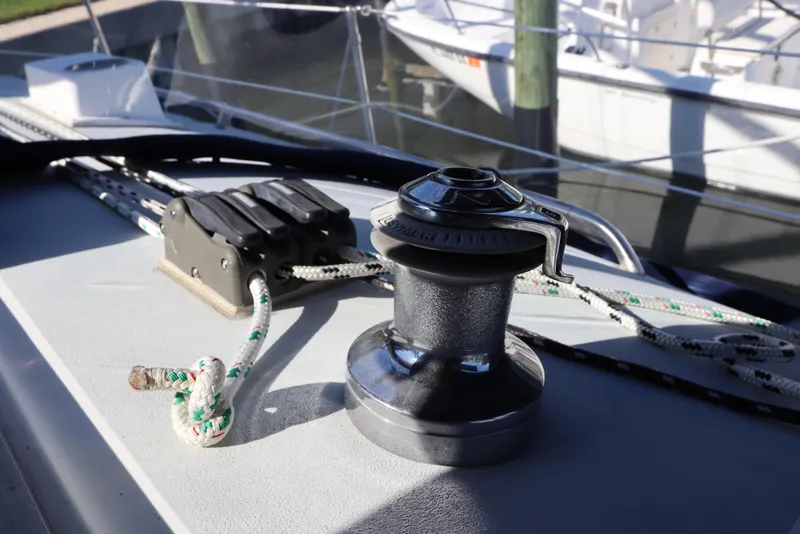 Slide: The Image of Winch and rope on 1995 Nonsuch 260 sailboat deck, docked in marina. - 20