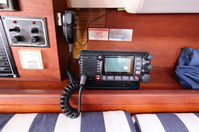 Slide: The Image of VHF radio and control panel on 1995 Nonsuch 260 sailboat interior. - 29