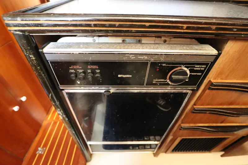 Slide: The Image of Frigidaire dishwasher in a 1991 Spectrum 48 Convertible yacht kitchen. - 21