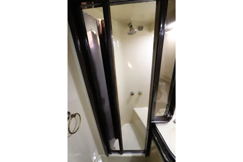 Slide: The Image of Shower area in 1991 Spectrum 48 Convertible yacht bathroom. - 33