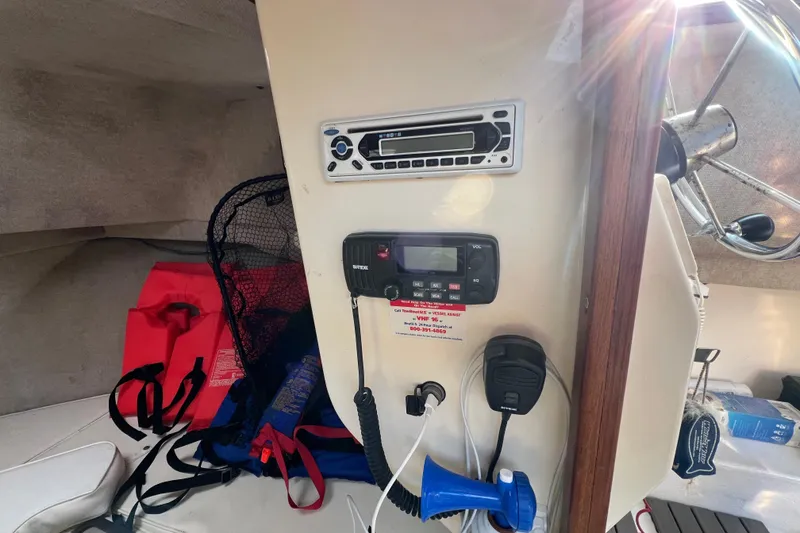 Slide: The Image of Interior of 2001 Parker 2520 Deep Vee Sport Cabin with radio and safety gear. - 10