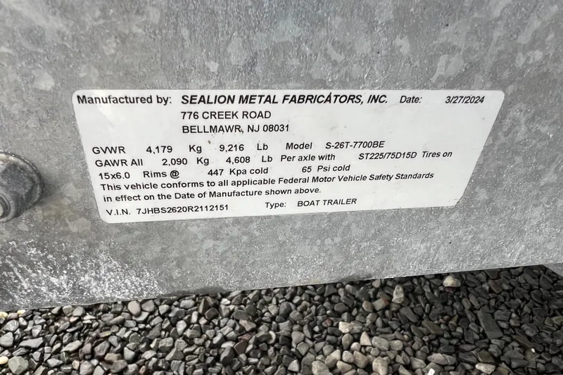 Slide: The Image of Label on Sealion Metal Fabricators boat trailer, model S-26T-7700BE, manufactured 3/27/2024. - 14