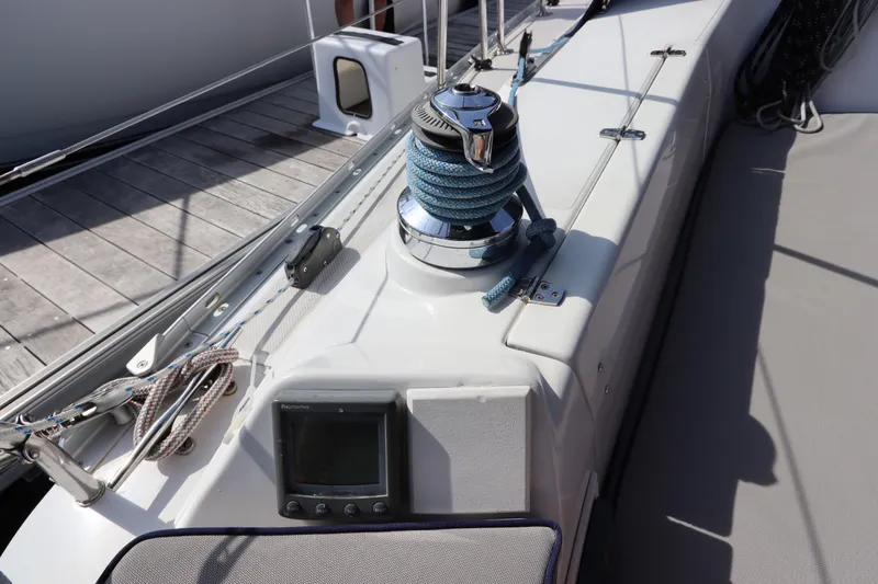 Slide: The Image of Deck of 2011 Catalina 355 sailboat with winch and navigation display. - 16
