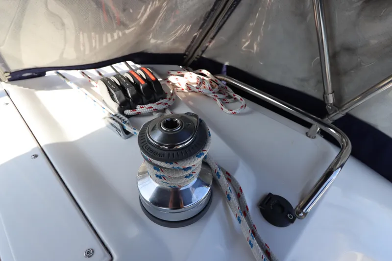 Slide: The Image of Winch and ropes on 2011 Catalina 355 sailboat deck, under protective canopy. - 24