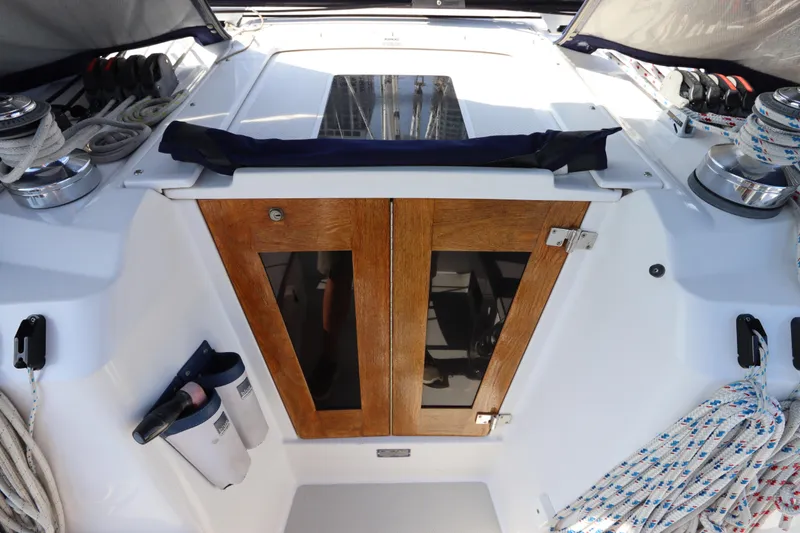 Slide: The Image of Cockpit of 2011 Catalina 355 sailboat with wooden doors and winches. - 26