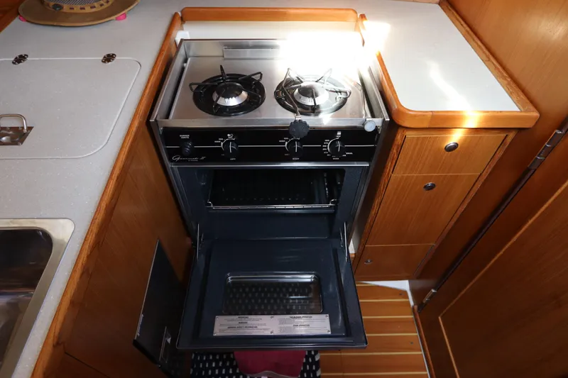 Slide: The Image of Catalina 355 yacht kitchen with stove and oven, 2011 model. - 33