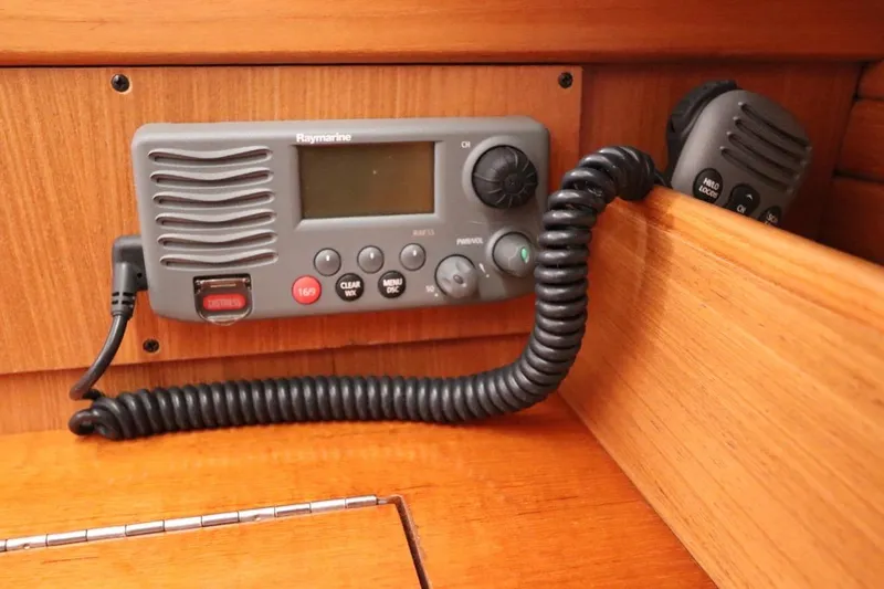 Slide: The Image of Raymarine marine radio on 2011 Catalina 355 sailboat, mounted on wooden panel. - 39