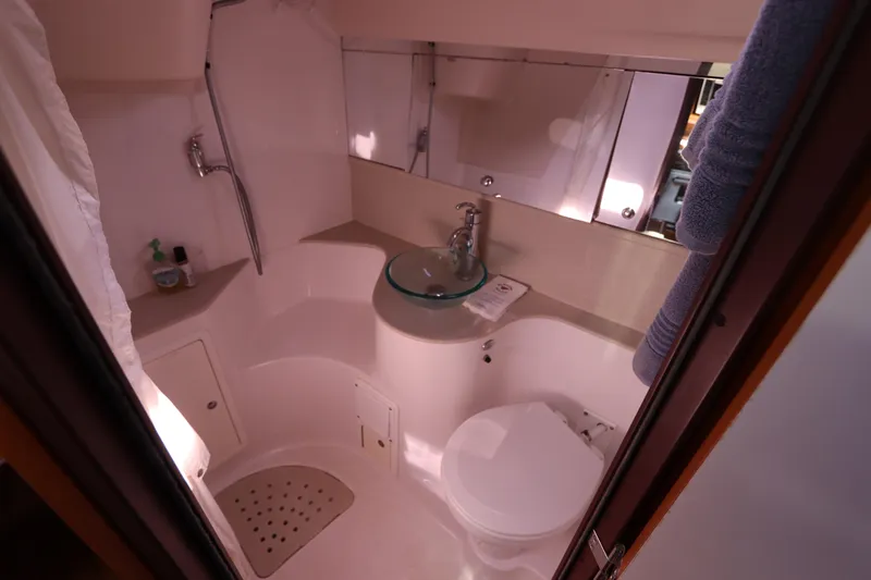 Slide: The Image of Bathroom interior of 2011 Catalina 355 yacht with modern fixtures and compact design. - 51