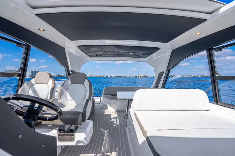 Slide: The Image of Interior view of 2021 Azimut Atlantis 51 yacht with ocean backdrop. - 29