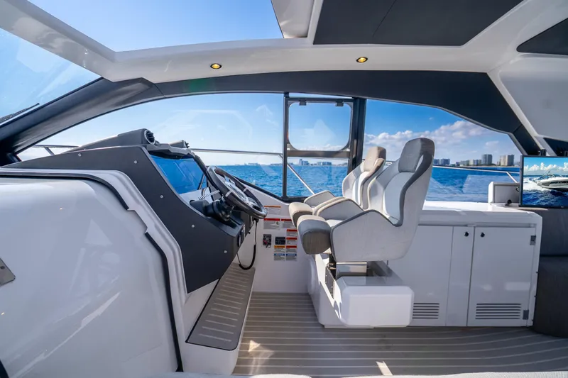 Slide: The Image of Luxurious 2021 Azimut Atlantis 51 yacht cockpit with modern seating and ocean view. - 31