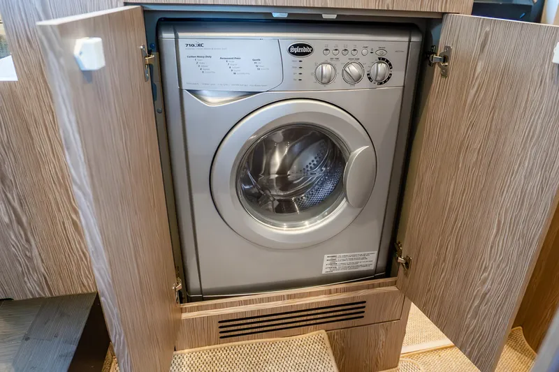 Slide: The Image of Built-in washing machine on Azimut Atlantis 51 yacht, 2021 model. - 61