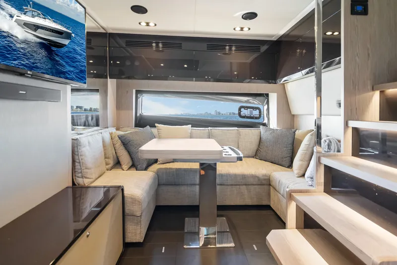 Slide: The Image of Luxurious interior of 2021 Azimut Atlantis 51 yacht with modern seating and elegant design. - 65