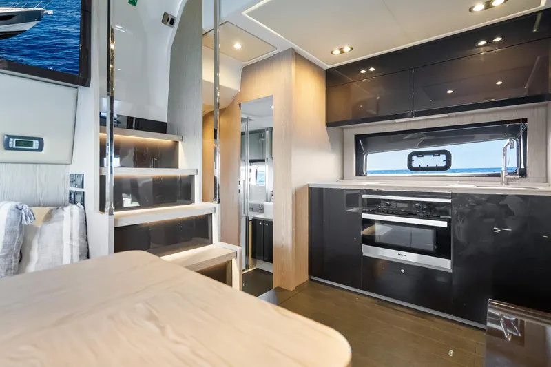 Slide: The Image of Modern interior of 2021 Azimut Atlantis 51 yacht with sleek kitchen and staircase. - 68