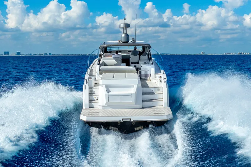 Slide: The Image of 2021 Azimut Atlantis 51 yacht cruising on open blue sea under clear sky. - 7