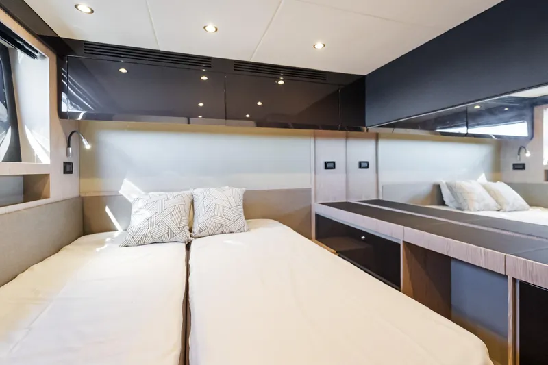 Slide: The Image of Interior of 2021 Azimut Atlantis 51 yacht with twin beds and modern design. - 72