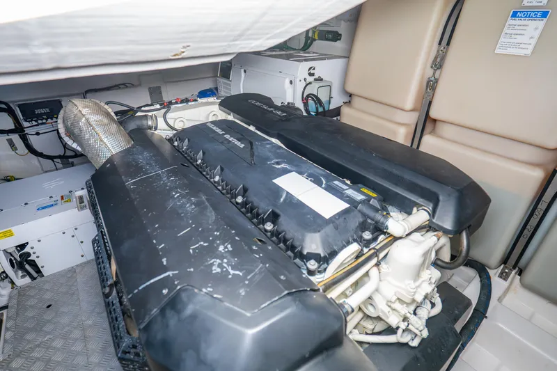 Slide: The Image of Engine room of 2021 Azimut Atlantis 51 yacht, showcasing powerful machinery and components. - 75