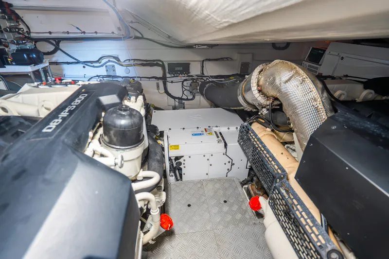 Slide: The Image of Engine room of 2021 Azimut Atlantis 51 yacht, showcasing advanced machinery and components. - 76