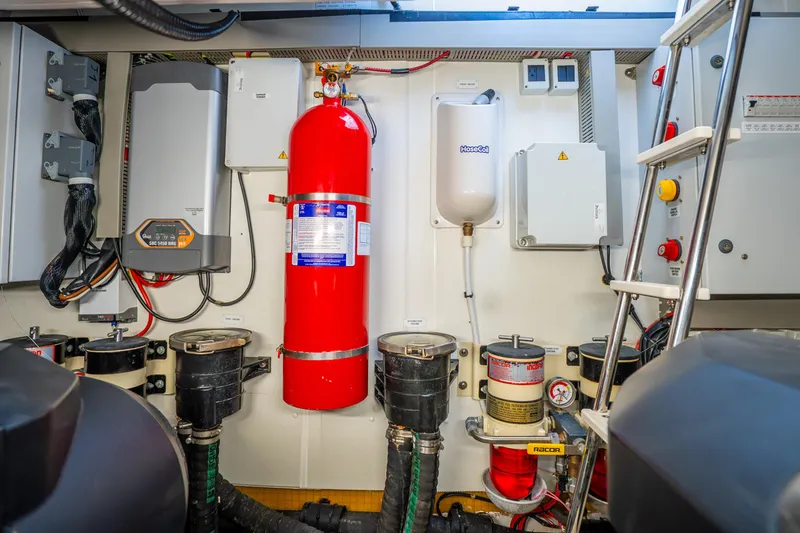 Slide: The Image of Engine room of 2021 Azimut Atlantis 51 yacht with safety equipment and control systems. - 82