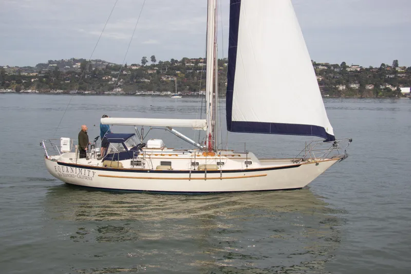 Slide: The Image of Pacific Seacraft 37 sloop, 1992, sailing near San Francisco, calm waters, clear sky. - 3