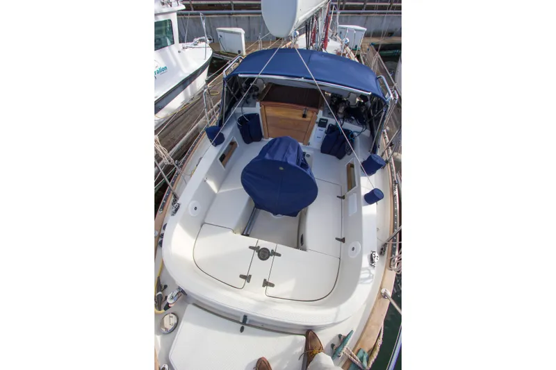 Slide: The Image of 1992 Pacific Seacraft 37 sloop with blue covers and spacious cockpit. - 30