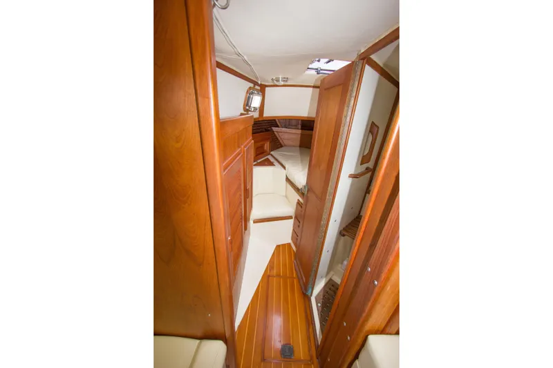 Slide: The Image of Interior of 1992 Pacific Seacraft Cutter sailboat with wooden finishes and cozy cabin. - 22