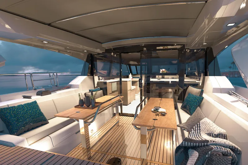 Slide: The Image of Luxurious 2026 Moody 48 Deck Saloon yacht interior with elegant seating and wooden tables. - 2